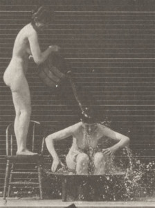 Nude_woman_pouring_a_bucket_of_water_over_another_nude_woman_(rbm-QP301M8-1887-406a~8)