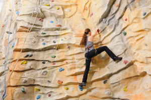 woman-climbing-wall